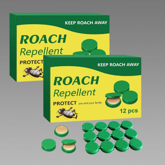 Two boxes of roach repellent with green capsules on a gray background